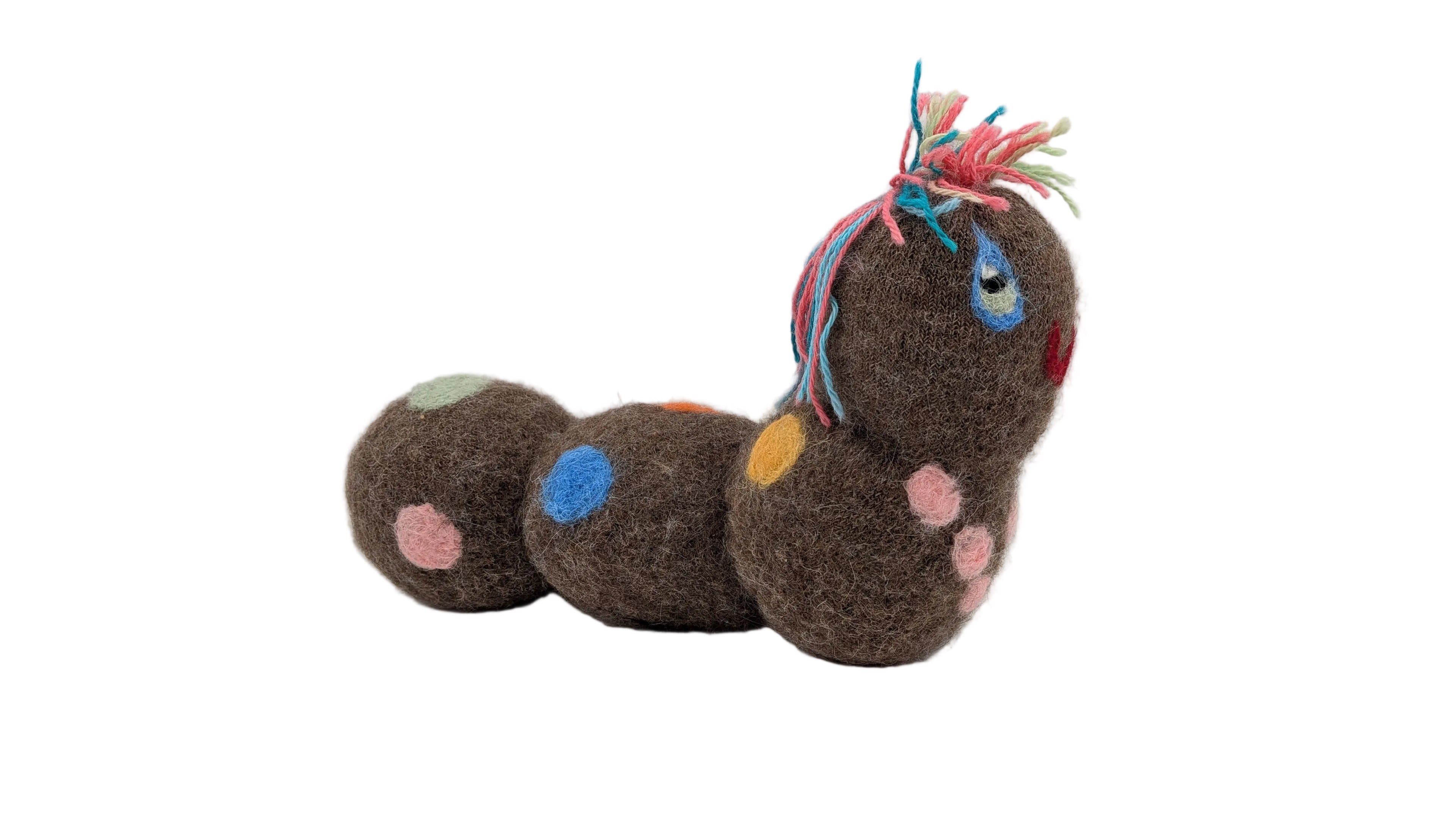 Caterpillar-shaped toy with colorful polka dots on a white background