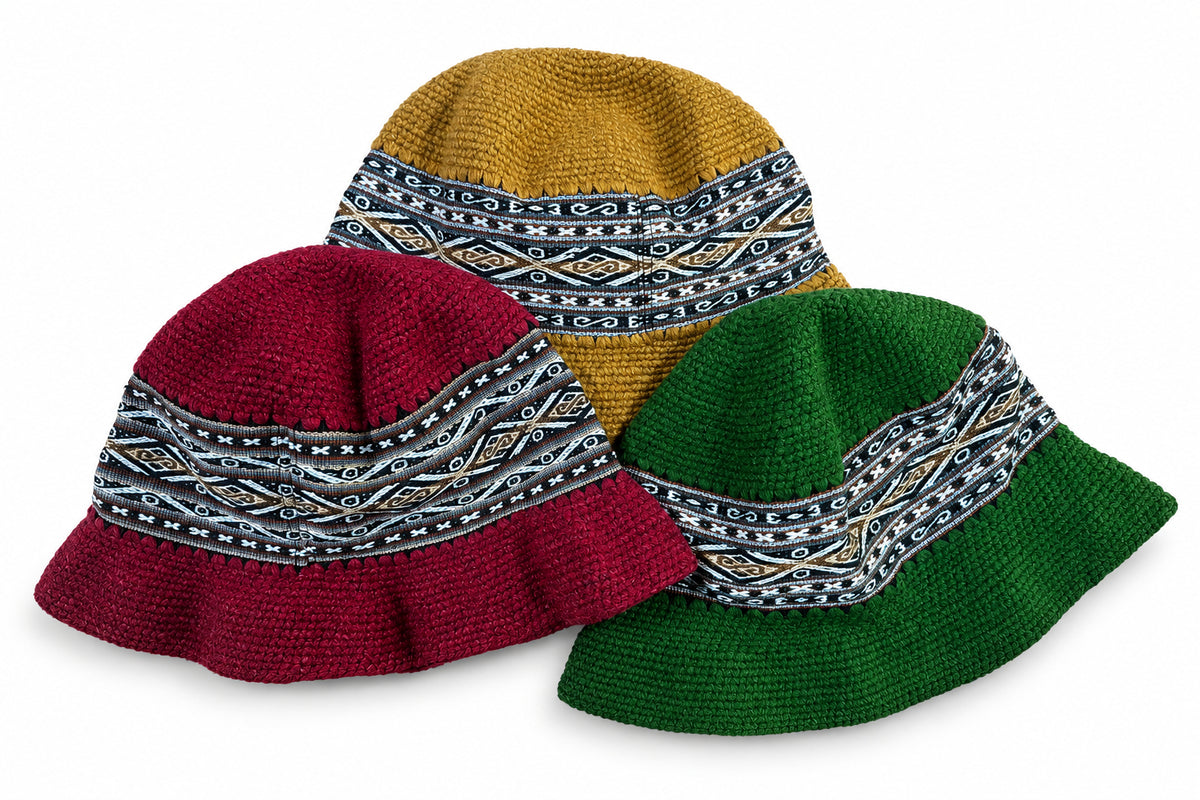 Crochet hats in 3 colors with a traditional knit belt design.