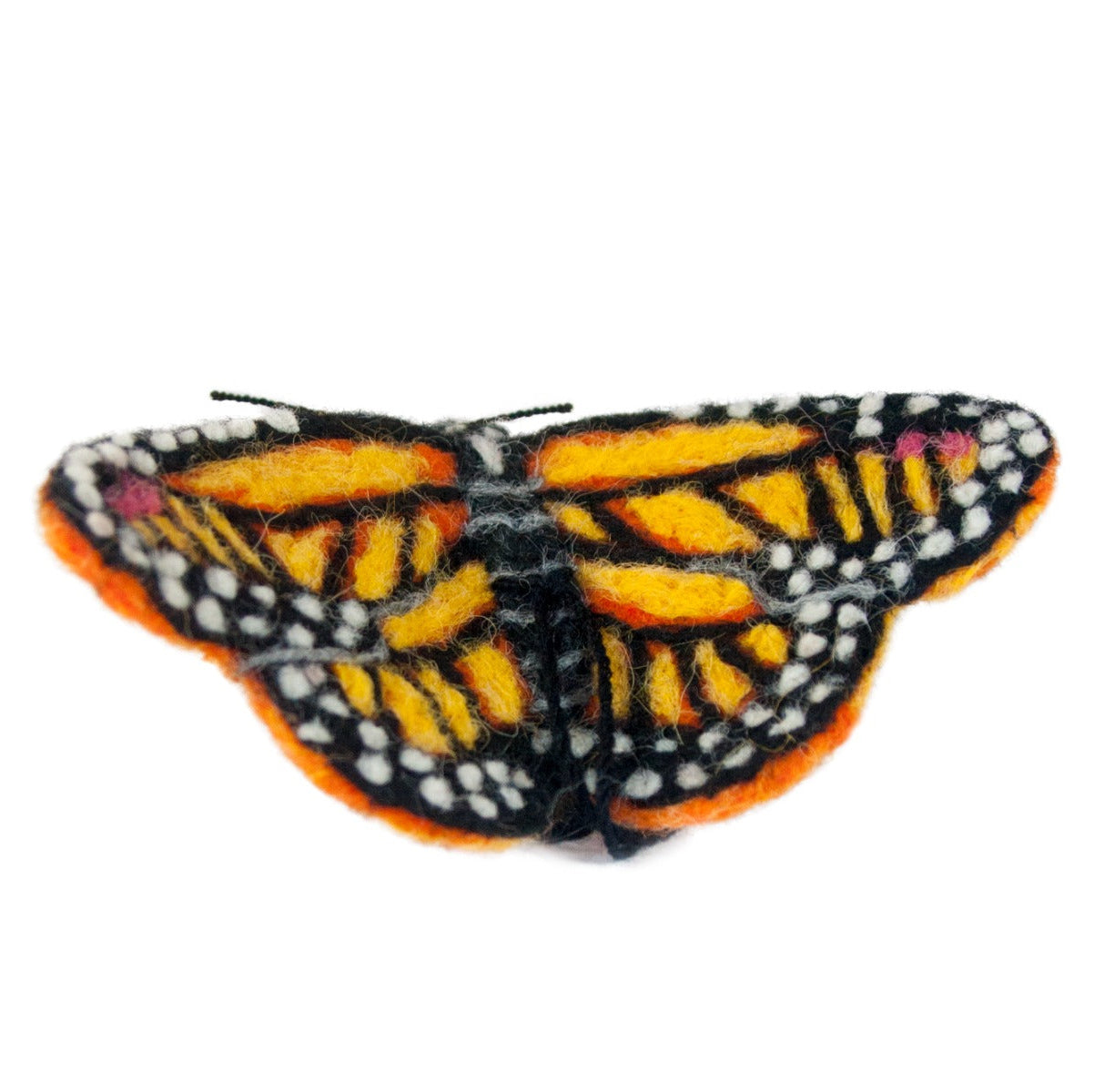 Felted butterfly with orange, black, and white pattern on a white background