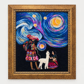 A framed textile artwork hanging on a light wall. The piece depicts a stylized starry night scene with swirling blue, purple, pink, and yellow stars and moons above two figures and a white alpaca on a black background.