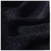 Close-up of dark textured fabric