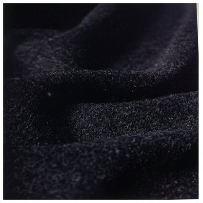 Close-up of dark textured fabric