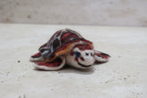 Close-up of a felted turtle