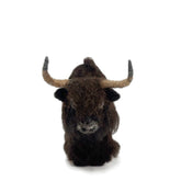 Felted wool sculpture of a yak head on a white background