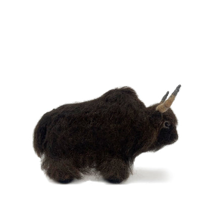Plush ornament of a dark brown yak with horns on a white background