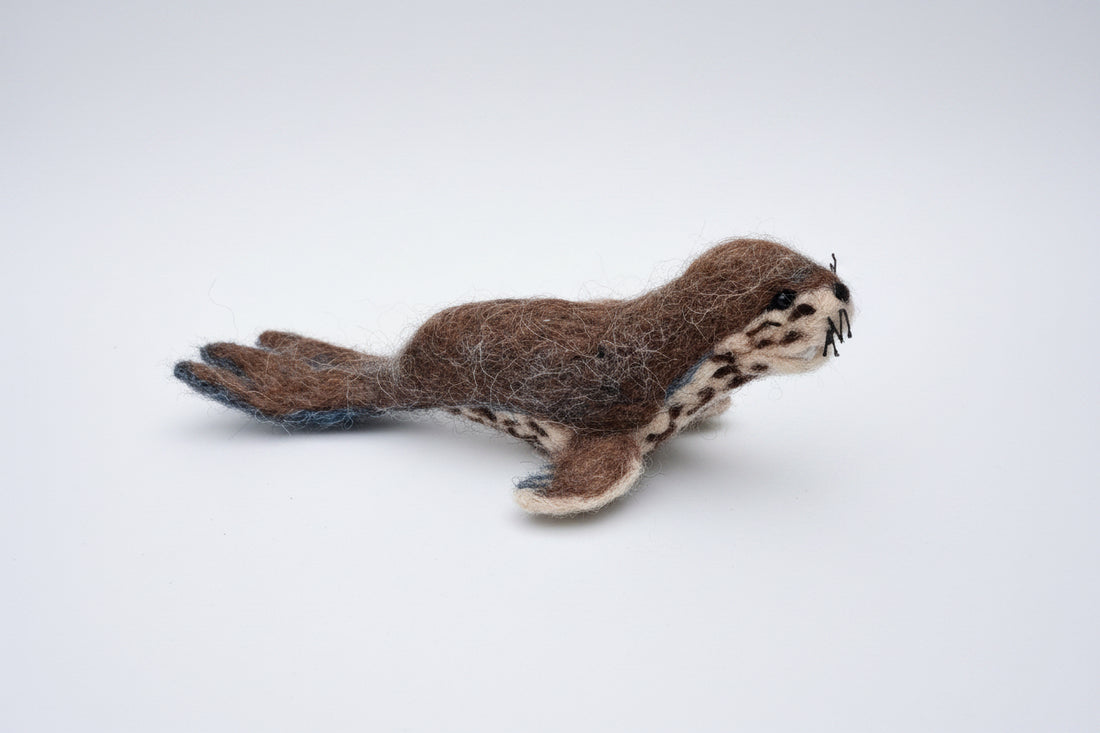 Needle-felted leopard seal realistic detail handmade ornament sculpture