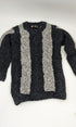 Black and gray striped kids sweater on a white background