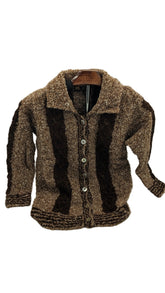 Brown textured kids sweater jacket on a hanger against a plain background
