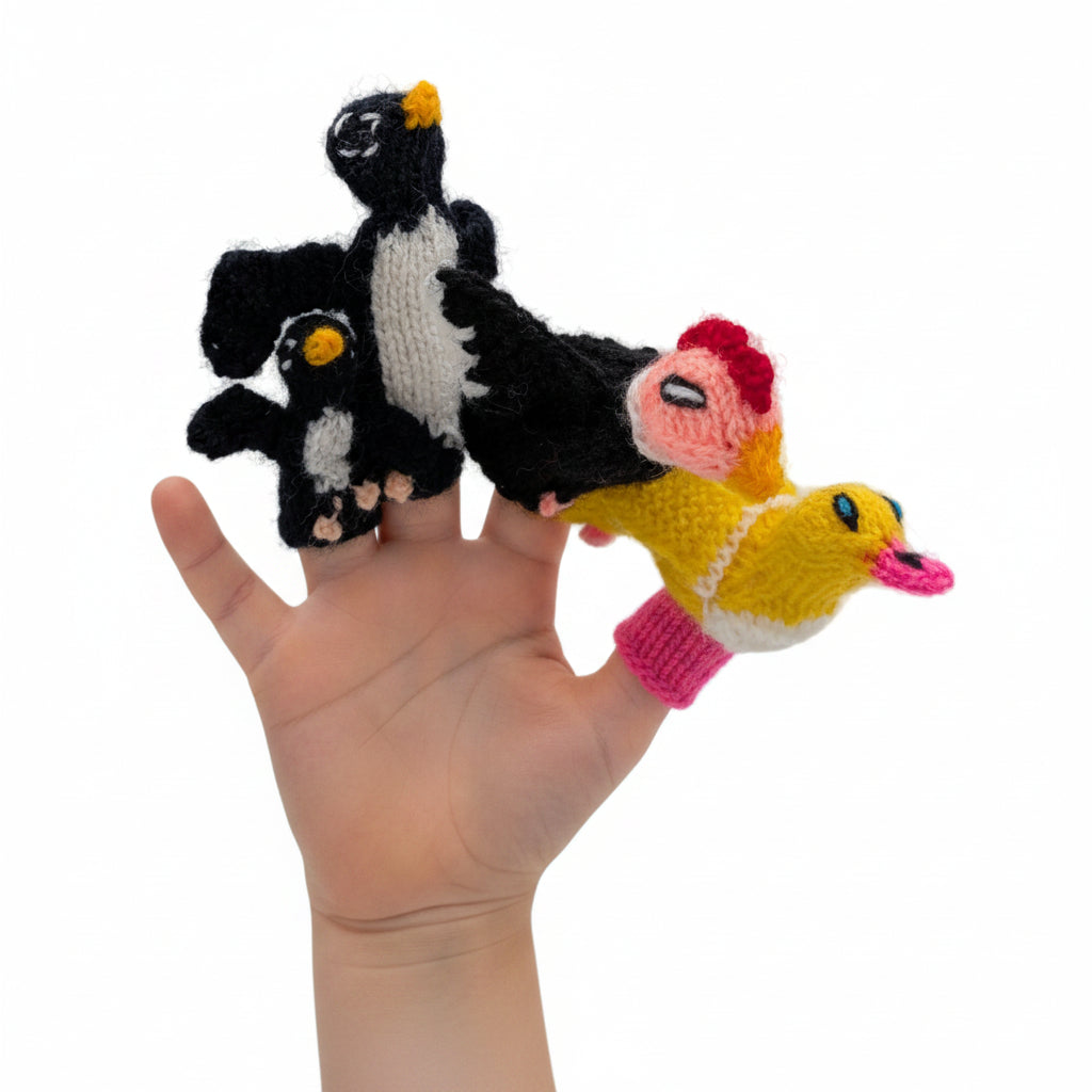 Hand knit penguin and bird finger puppets made from Alpaca yarn 