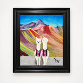 Framed artwork of two llamas in a colorful mountainous landscape