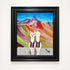 Framed artwork of two llamas in a colorful mountainous landscape