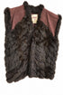 A sleeveless fur vest displayed. The vest features a dark brown shaggy fur body with dusty brown suede shoulder panels and a brown fur trim at the collar.