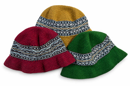 Crochet hats in 3 colors with a traditional knit belt design.