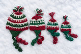 multiple sized traditional chullo hats in fun christmas colors