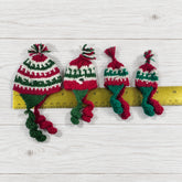 Traditional chullo hats in traditional christmas colors