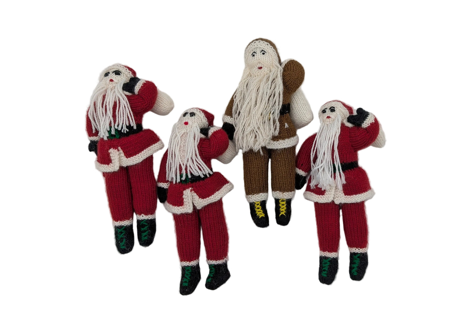 Four handmade knitted Christmas Santa Claus figures arranged vertically on a plain white background.
