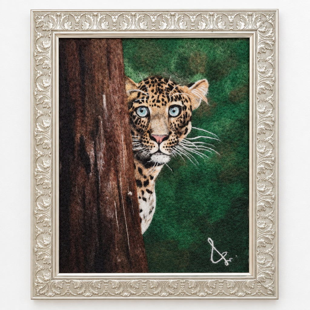 Framed artwork of a leopard peeking from behind a tree