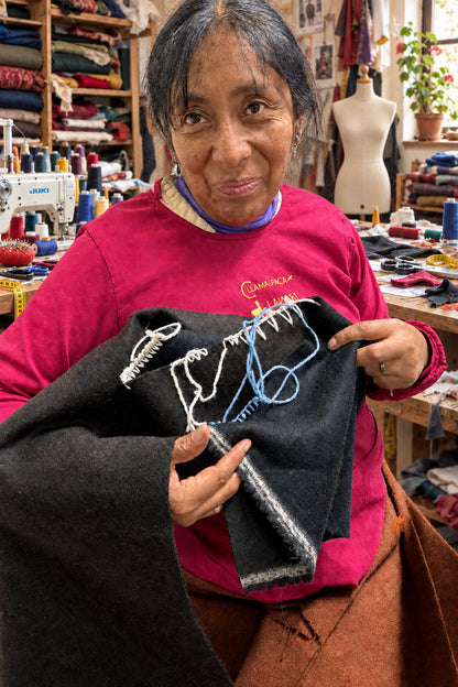 Martita making the stitching for the Boho